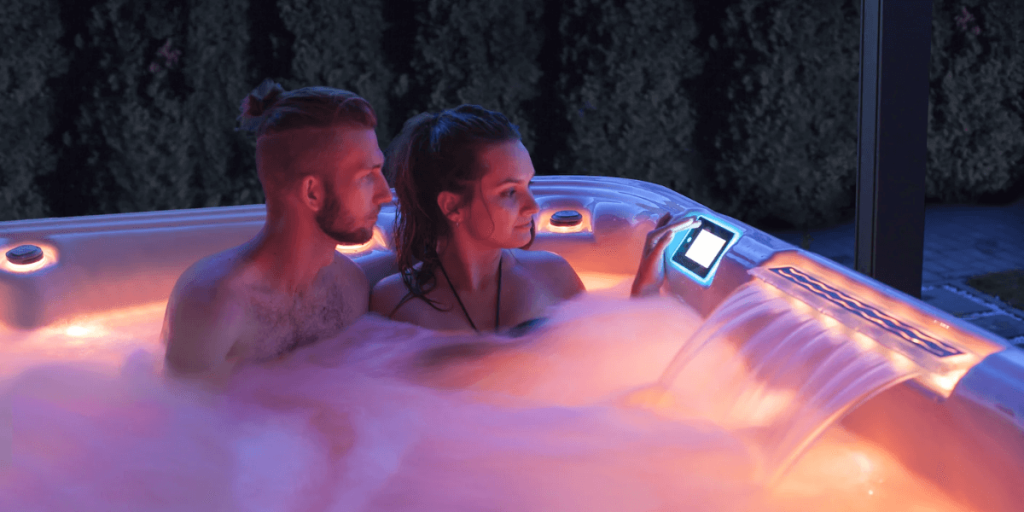 A romantic couple relaxing in a hot tub, enjoying a serene and intimate moment together in a peaceful setting